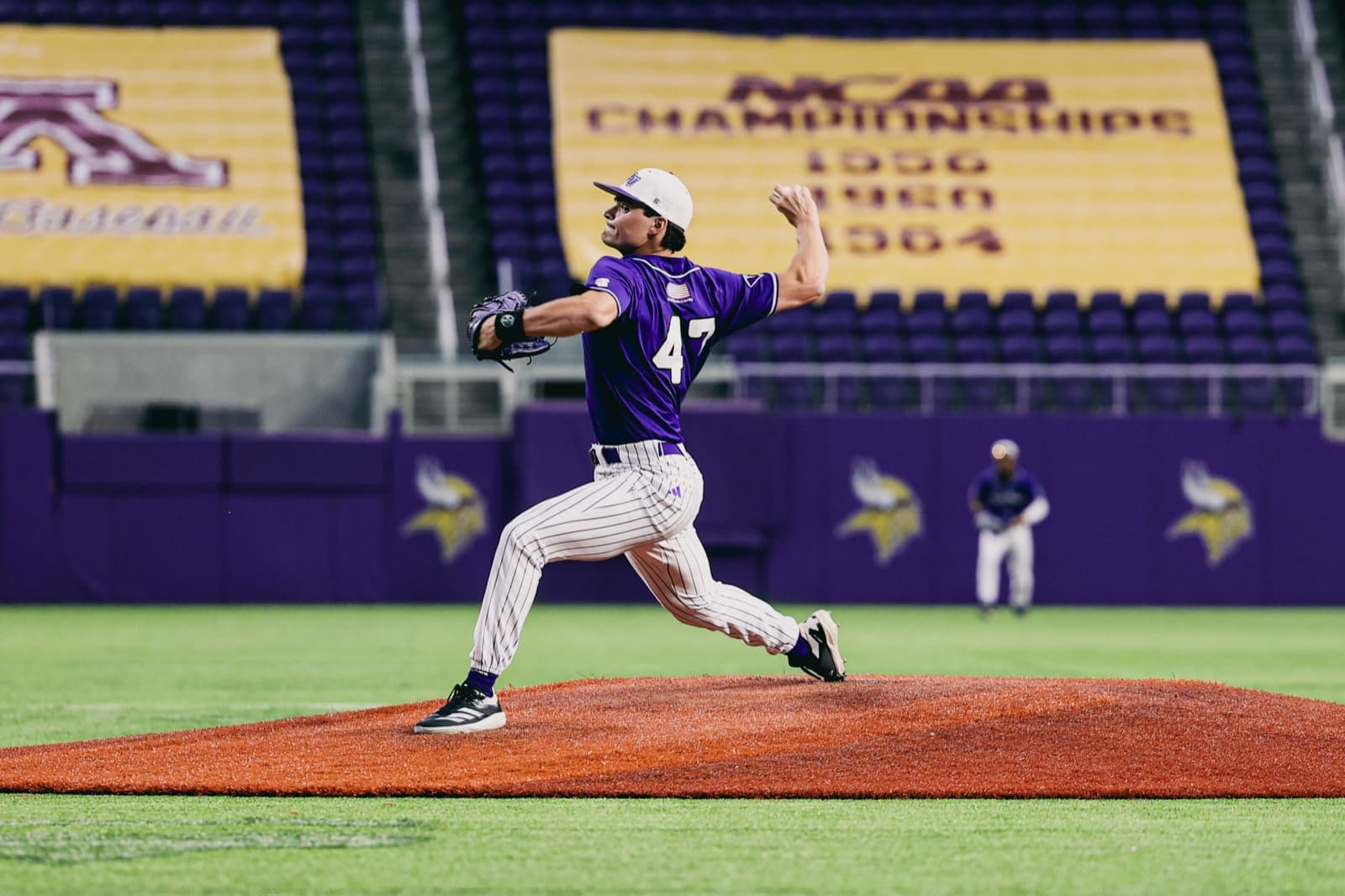 Mid-windup in a High Point uniform
